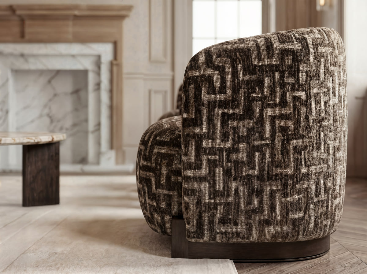 A close-up of a patterned occasional chair